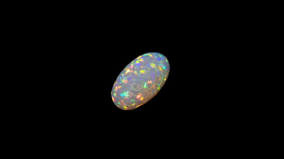 8.5 carat rare and unusual wavey honeycomb pattern Welo Ethiopia oval shaped cabochon.